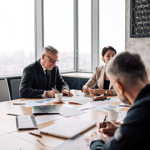 Lawyers in Conference Room During Business Sale.